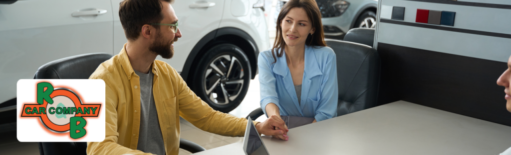 A satisfied customer checking trade-in car value at a trusted South Bend dealership.