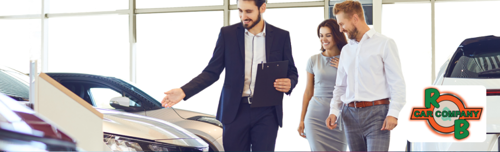Sales team member assisting customer with a test drive at the R&B Car Company South Bend dealership