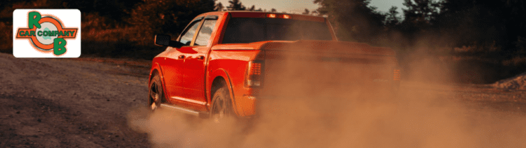 Lineup of used 4x4 trucks on display at R&B Car Company South Bend dealership
