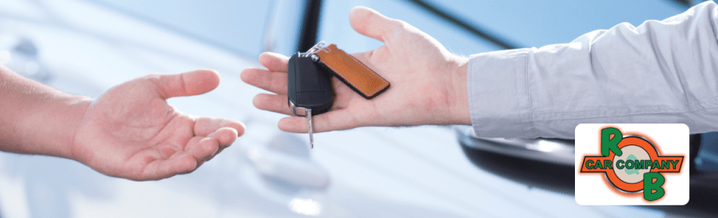 Customer comparing Carvana and Max Allowance car offers in the South Bend showroom