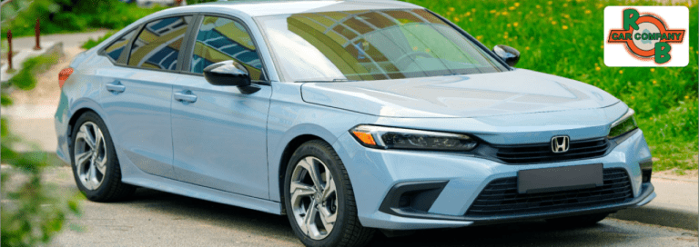 A selection of used Honda SUVs is parked at R&B Car Company South Bend under sunny skies.