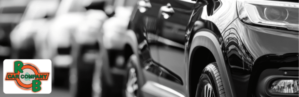 Used SUV models parked on the lot at R&B Car Company South Bend under clear skies.