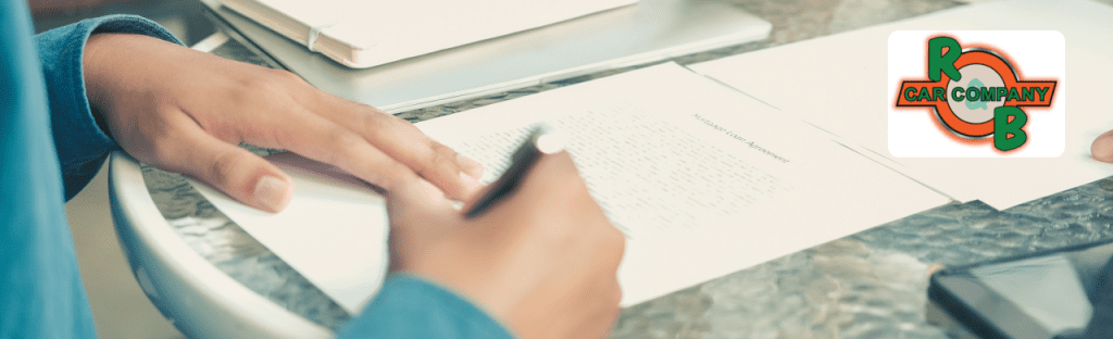  Friendly sales team assisting a customer at R&B Car Company, South Bend
