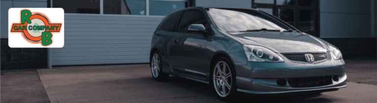 A lineup of used Honda vehicles on the lot at R&B Car Company South Bend under a clear Indiana sky.