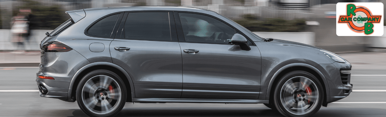 Customer browsing affordable used trucks and SUVs under $20,000 at R&B Car Company South Bend lot in South Bend, IN.