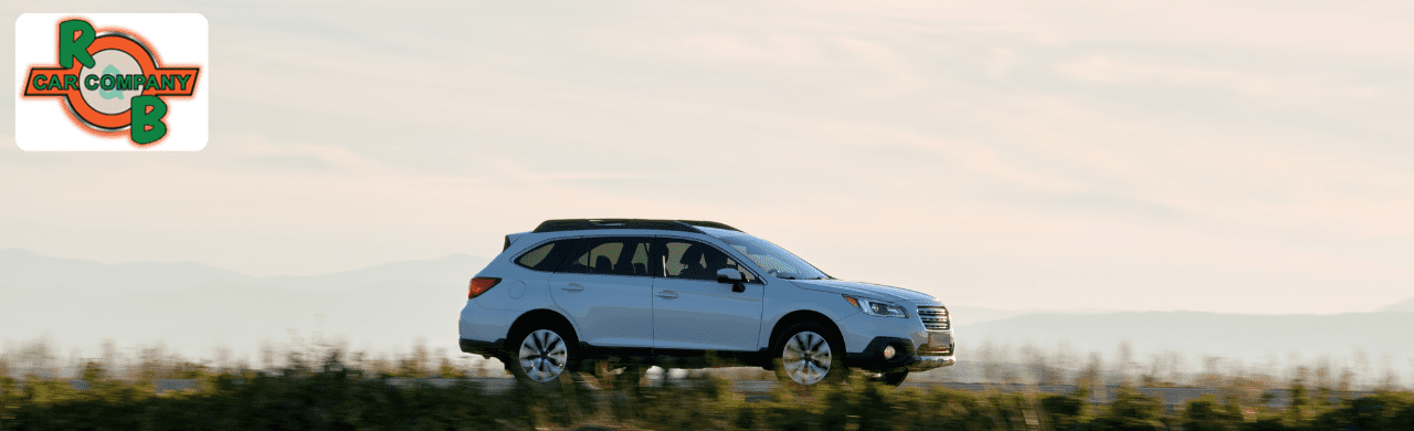 Budget-friendly used SUVs and sedans lined up at the R&B Car Company South Bend dealership in South Bend, Indiana.